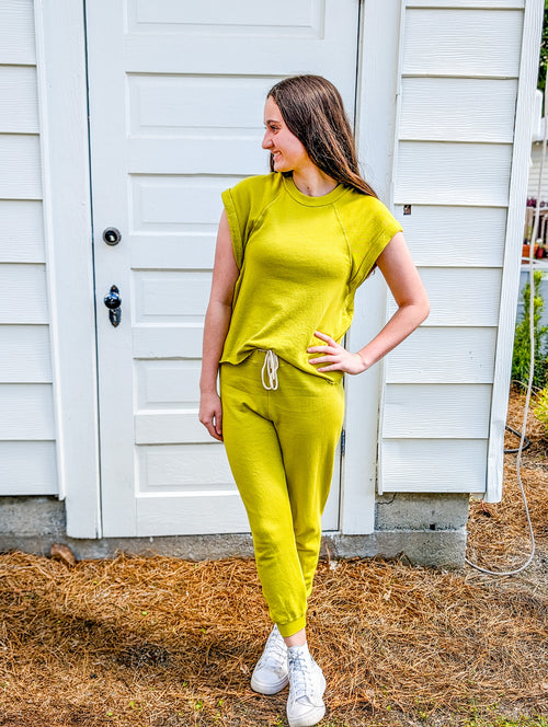 Alyssa standing full body photo with Keziah Lime Joggers and matching Wesley Lime Sweatshirt. 