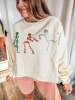 Cream sequin dancing skeleton cropped sweatshirt