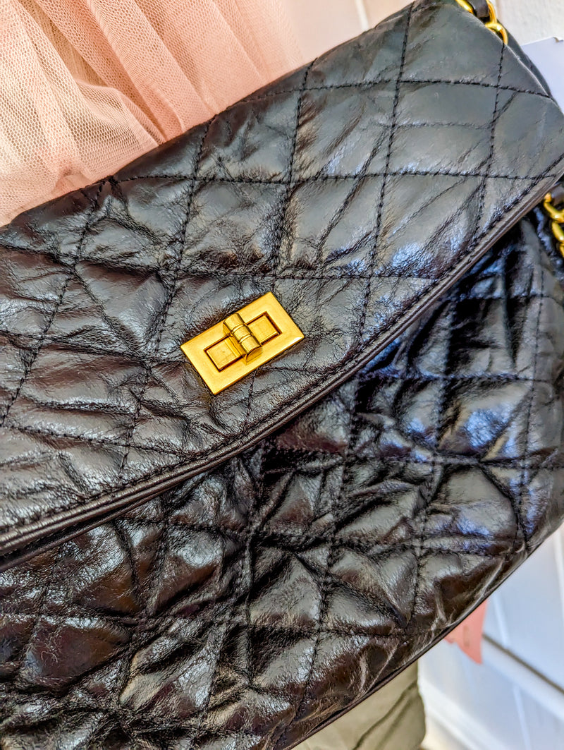 Black Super Soft Quilted Bag with Gold Detailing on Straps