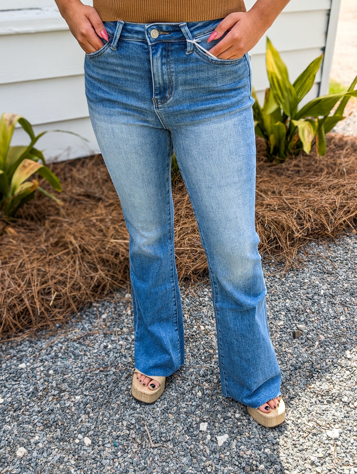 *Final Sale* Medium Wash Raw Hem High Rise Flared Jeans