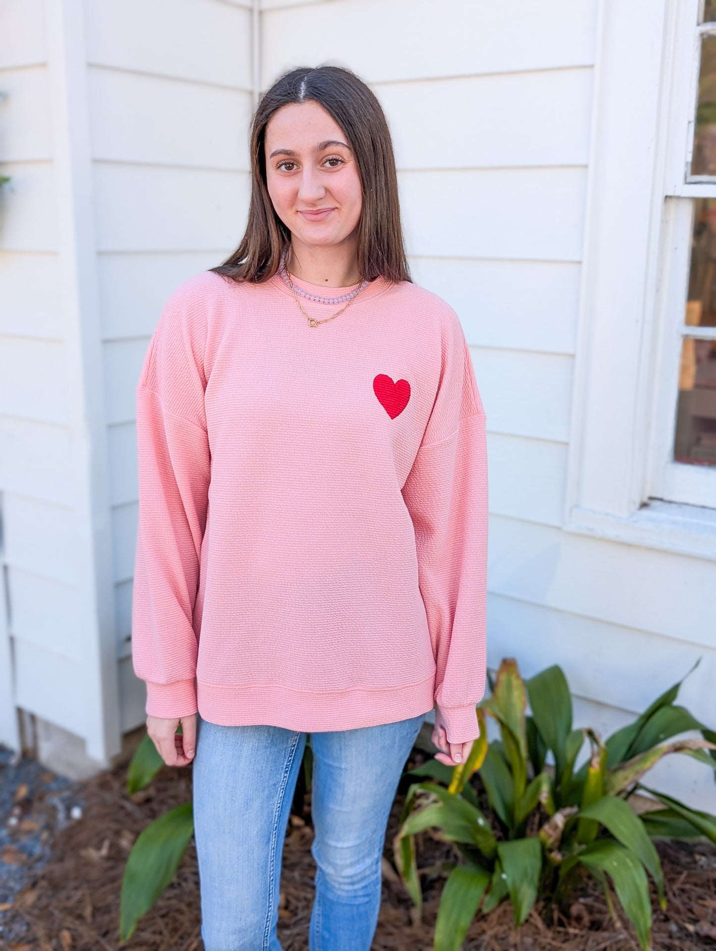 Pink Sweatshirt with Red Heart Graphic